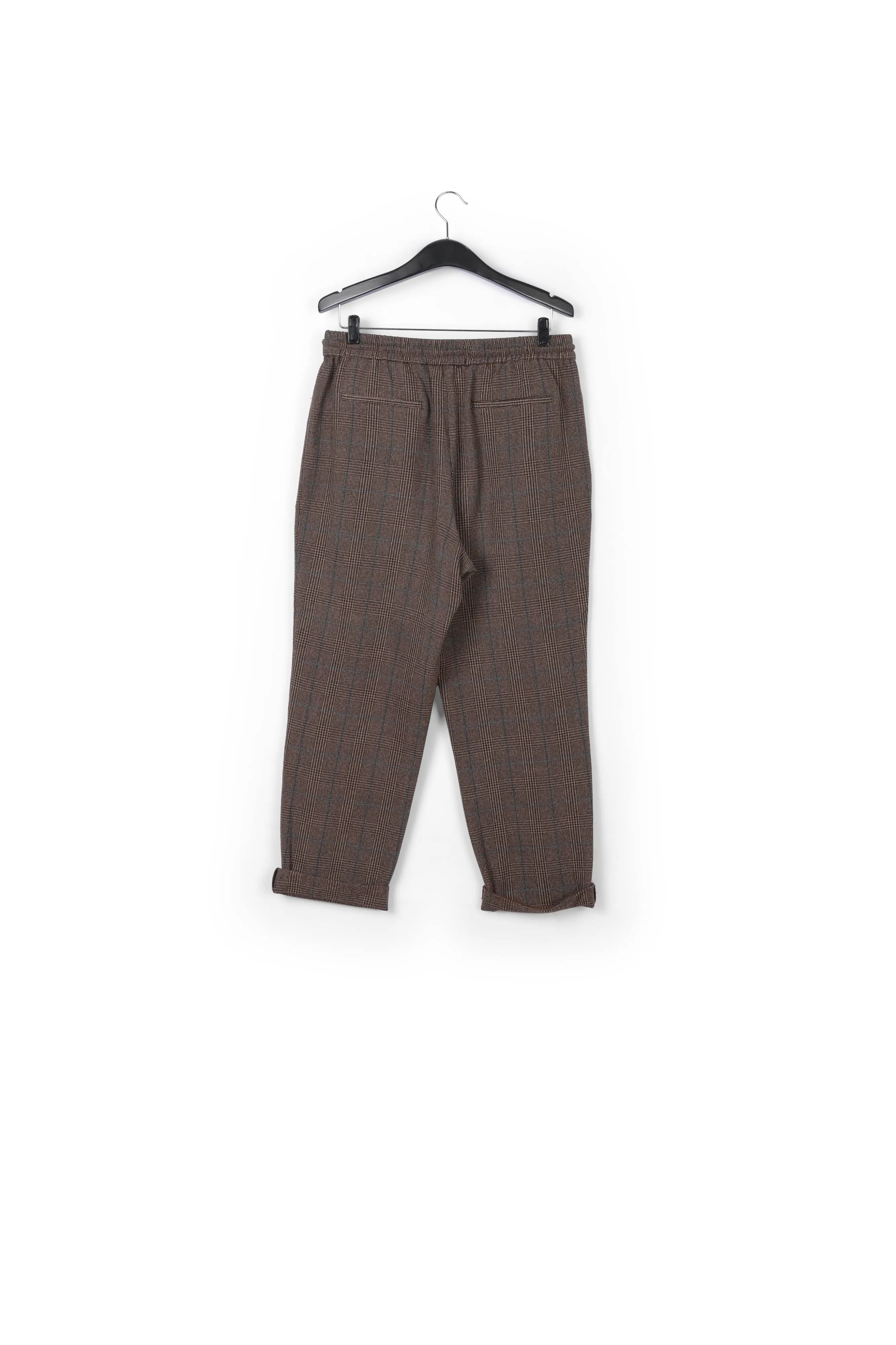 Brown pants with beige and pink check motif