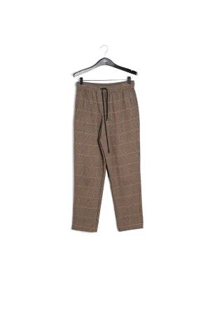 Brown pants with beige and pink check motif