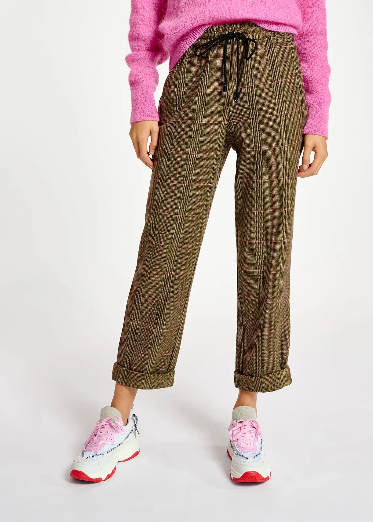 Brown pants with beige and pink check motif
