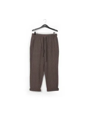 Brown pants with beige and pink check motif