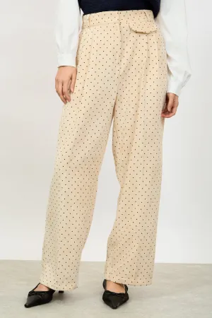 Ivory polka dot flap pocket trousers