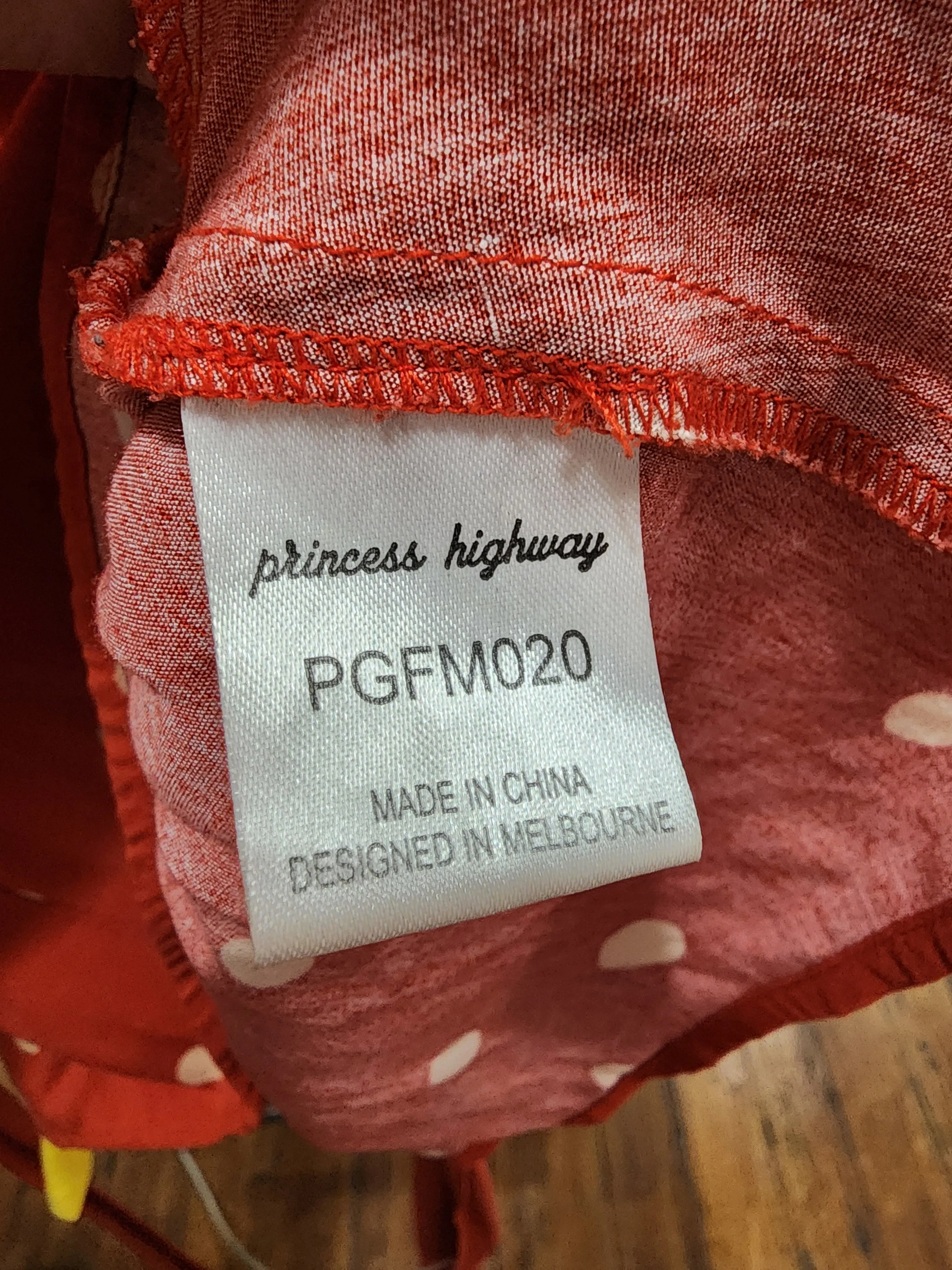Princess Highway red polka dot top size 12